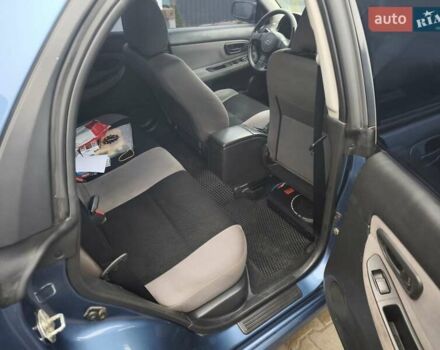 Синий Субару Импреза, объемом двигателя 1.99 л и пробегом 350 тыс. км за 4000 $, фото 5 на Automoto.ua