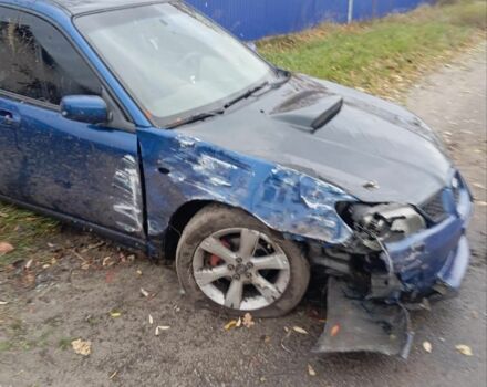 Синий Субару Импреза, объемом двигателя 2 л и пробегом 360 тыс. км за 3000 $, фото 2 на Automoto.ua