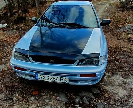Синий Субару Импреза, объемом двигателя 1.6 л и пробегом 250 тыс. км за 2500 $, фото 1 на Automoto.ua
