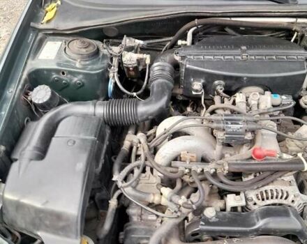 Зеленый Субару Импреза, объемом двигателя 1.6 л и пробегом 195 тыс. км за 3990 $, фото 8 на Automoto.ua