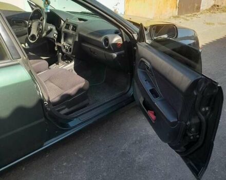 Зеленый Субару Импреза, объемом двигателя 1.6 л и пробегом 195 тыс. км за 3990 $, фото 3 на Automoto.ua