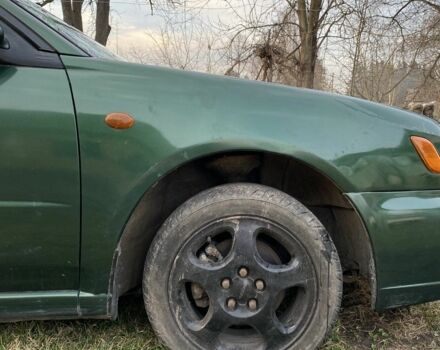 Зеленый Субару Импреза, объемом двигателя 1.6 л и пробегом 186 тыс. км за 2858 $, фото 5 на Automoto.ua