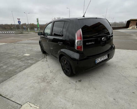 Черный Субару Джасти, объемом двигателя 1 л и пробегом 182 тыс. км за 3999 $, фото 5 на Automoto.ua