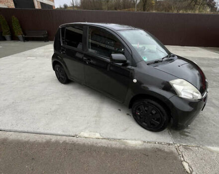 Черный Субару Джасти, объемом двигателя 1 л и пробегом 182 тыс. км за 3999 $, фото 2 на Automoto.ua