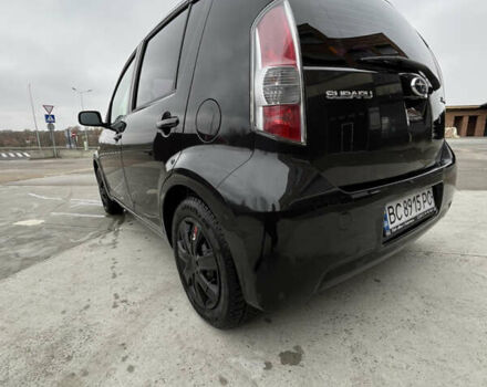 Черный Субару Джасти, объемом двигателя 1 л и пробегом 182 тыс. км за 3999 $, фото 9 на Automoto.ua