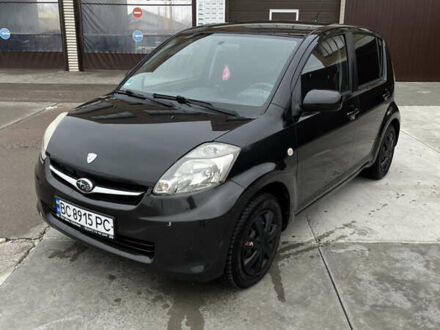 Черный Субару Джасти, объемом двигателя 1 л и пробегом 182 тыс. км за 3999 $, фото 1 на Automoto.ua