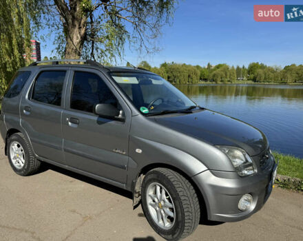 Сірий Субару Джасті, об'ємом двигуна 1.3 л та пробігом 200 тис. км за 5500 $, фото 7 на Automoto.ua