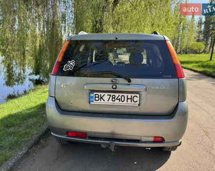 Сірий Субару Джасті, об'ємом двигуна 1.3 л та пробігом 200 тис. км за 5500 $, фото 4 на Automoto.ua