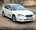Белый Субару Легаси, объемом двигателя 2 л и пробегом 250 тыс. км за 3850 $, фото 1 на Automoto.ua
