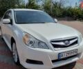 Белый Субару Легаси, объемом двигателя 2.46 л и пробегом 245 тыс. км за 7200 $, фото 1 на Automoto.ua