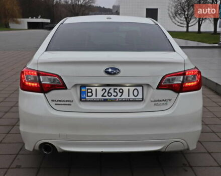Белый Субару Легаси, объемом двигателя 2.5 л и пробегом 240 тыс. км за 8999 $, фото 7 на Automoto.ua