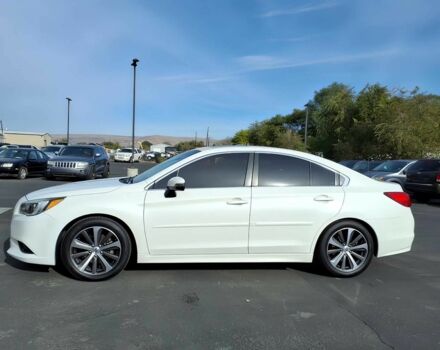 Белый Субару Легаси, объемом двигателя 2.5 л и пробегом 72 тыс. км за 9000 $, фото 2 на Automoto.ua