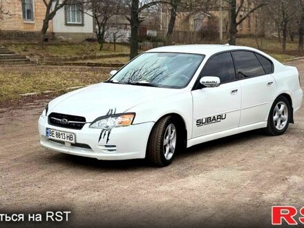 Белый Субару Легаси, объемом двигателя 2 л и пробегом 250 тыс. км за 3850 $, фото 1 на Automoto.ua