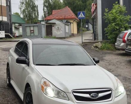 Белый Субару Легаси, объемом двигателя 2.46 л и пробегом 124 тыс. км за 11500 $, фото 1 на Automoto.ua