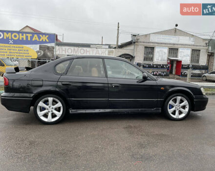 Черный Субару Легаси, объемом двигателя 2.46 л и пробегом 324 тыс. км за 4200 $, фото 9 на Automoto.ua