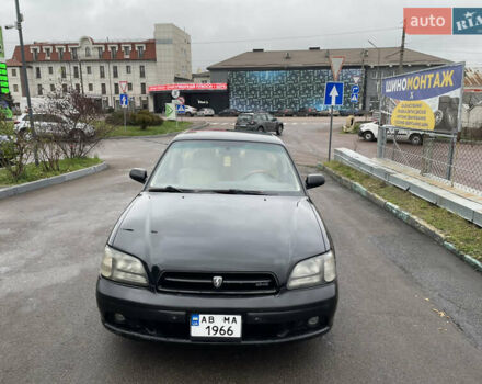 Черный Субару Легаси, объемом двигателя 2.46 л и пробегом 324 тыс. км за 4200 $, фото 1 на Automoto.ua