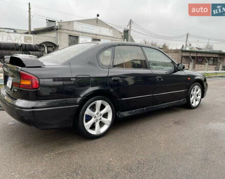 Черный Субару Легаси, объемом двигателя 2.46 л и пробегом 324 тыс. км за 4200 $, фото 3 на Automoto.ua