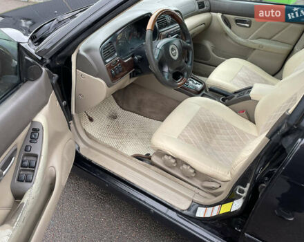 Черный Субару Легаси, объемом двигателя 2.46 л и пробегом 324 тыс. км за 4200 $, фото 12 на Automoto.ua