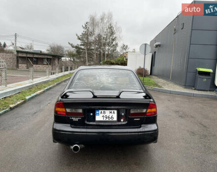 Черный Субару Легаси, объемом двигателя 2.46 л и пробегом 324 тыс. км за 4200 $, фото 5 на Automoto.ua