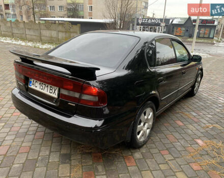 Чорний Субару Легасі, об'ємом двигуна 1.99 л та пробігом 315 тис. км за 2900 $, фото 4 на Automoto.ua