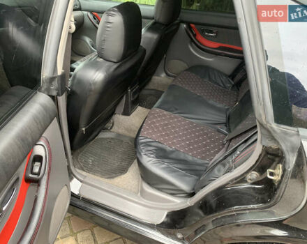 Чорний Субару Легасі, об'ємом двигуна 1.99 л та пробігом 315 тис. км за 2900 $, фото 10 на Automoto.ua