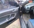 Черный Субару Легаси, объемом двигателя 1.99 л и пробегом 145 тыс. км за 4850 $, фото 1 на Automoto.ua