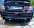Черный Субару Легаси, объемом двигателя 3 л и пробегом 260 тыс. км за 6600 $, фото 1 на Automoto.ua