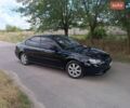 Черный Субару Легаси, объемом двигателя 2 л и пробегом 320 тыс. км за 4000 $, фото 1 на Automoto.ua