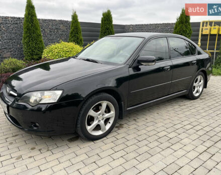 Черный Субару Легаси, объемом двигателя 1.99 л и пробегом 324 тыс. км за 4300 $, фото 1 на Automoto.ua