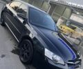 Черный Субару Легаси, объемом двигателя 2 л и пробегом 217 тыс. км за 5300 $, фото 1 на Automoto.ua