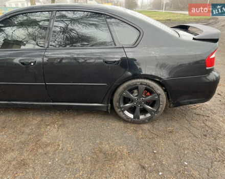 Черный Субару Легаси, объемом двигателя 1.99 л и пробегом 327 тыс. км за 5500 $, фото 8 на Automoto.ua