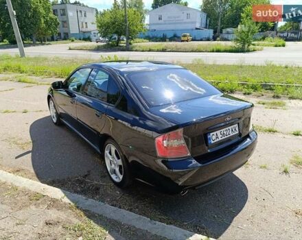 Чорний Субару Легасі, об'ємом двигуна 2 л та пробігом 287 тис. км за 5400 $, фото 2 на Automoto.ua