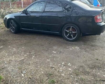 Черный Субару Легаси, объемом двигателя 1.99 л и пробегом 240 тыс. км за 4800 $, фото 4 на Automoto.ua