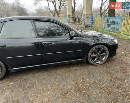 Черный Субару Легаси, объемом двигателя 1.99 л и пробегом 327 тыс. км за 5500 $, фото 6 на Automoto.ua