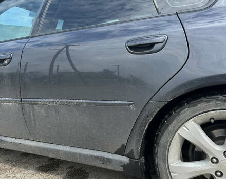 Черный Субару Легаси, объемом двигателя 2.46 л и пробегом 285 тыс. км за 5200 $, фото 5 на Automoto.ua