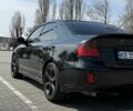 Черный Субару Легаси, объемом двигателя 2 л и пробегом 220 тыс. км за 5700 $, фото 1 на Automoto.ua