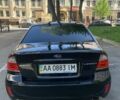 Черный Субару Легаси, объемом двигателя 1.99 л и пробегом 161 тыс. км за 7000 $, фото 1 на Automoto.ua