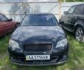 Черный Субару Легаси, объемом двигателя 2.46 л и пробегом 200 тыс. км за 4000 $, фото 1 на Automoto.ua