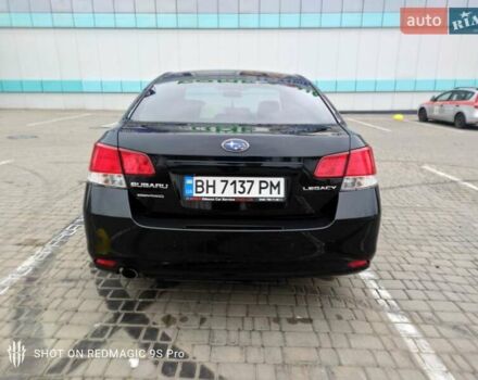 Черный Субару Легаси, объемом двигателя 2.46 л и пробегом 205 тыс. км за 8400 $, фото 4 на Automoto.ua