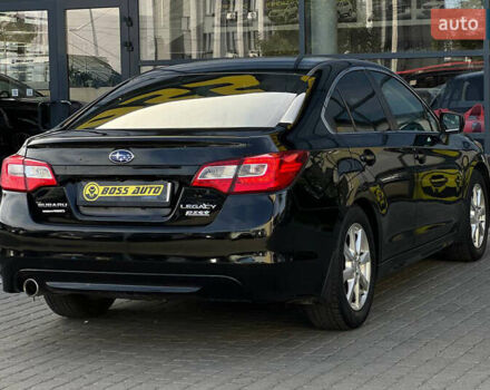 Черный Субару Легаси, объемом двигателя 2.5 л и пробегом 124 тыс. км за 10600 $, фото 5 на Automoto.ua