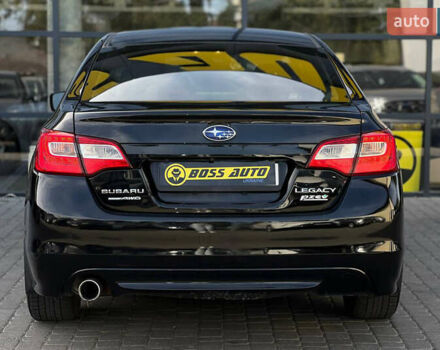 Черный Субару Легаси, объемом двигателя 2.5 л и пробегом 124 тыс. км за 10600 $, фото 4 на Automoto.ua