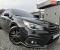 Черный Субару Легаси, объемом двигателя 2.5 л и пробегом 156 тыс. км за 10999 $, фото 2 на Automoto.ua