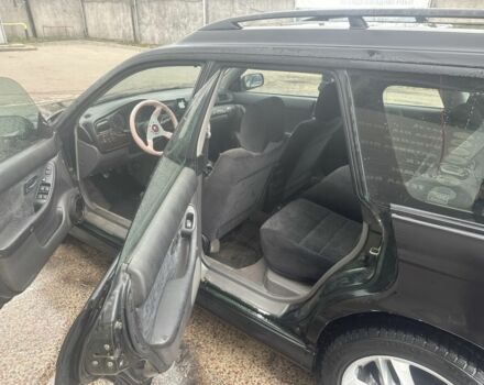 Черный Субару Легаси, объемом двигателя 2.5 л и пробегом 180 тыс. км за 2738 $, фото 5 на Automoto.ua