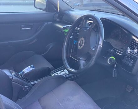 Черный Субару Легаси, объемом двигателя 2.5 л и пробегом 145 тыс. км за 4200 $, фото 1 на Automoto.ua