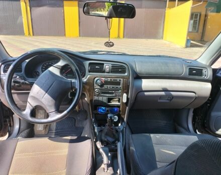 Чорний Субару Легасі, об'ємом двигуна 2 л та пробігом 215 тис. км за 5000 $, фото 5 на Automoto.ua