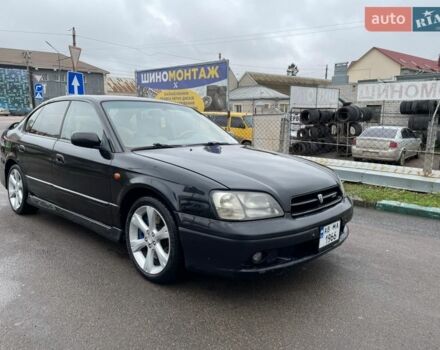 Черный Субару Легаси, объемом двигателя 2.46 л и пробегом 324 тыс. км за 3500 $, фото 1 на Automoto.ua