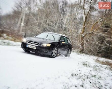 Черный Субару Легаси, объемом двигателя 3 л и пробегом 265 тыс. км за 6000 $, фото 1 на Automoto.ua