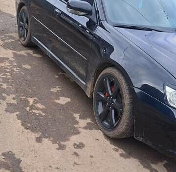 Черный Субару Легаси, объемом двигателя 2 л и пробегом 238 тыс. км за 5000 $, фото 1 на Automoto.ua