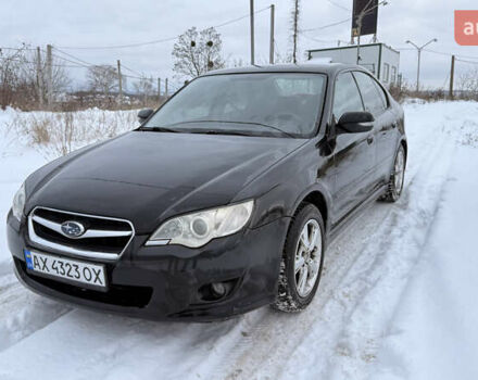 Черный Субару Легаси, объемом двигателя 2 л и пробегом 235 тыс. км за 5500 $, фото 1 на Automoto.ua
