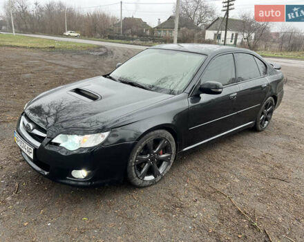 Черный Субару Легаси, объемом двигателя 1.99 л и пробегом 327 тыс. км за 5500 $, фото 1 на Automoto.ua